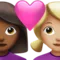 Couple with Heart: Woman, Woman, Medium-Dark Skin Tone, Medium-Light Skin Tone emoji on iPhone