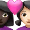 Couple with Heart: Woman, Woman, Dark Skin Tone, Light Skin Tone emoji on iPhone