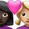 Couple with Heart: Woman, Woman, Dark Skin Tone, Medium-Light Skin Tone emoji on iPhone