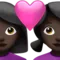 Couple with Heart: Woman, Woman, Dark Skin Tone emoji on iPhone