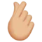 Hand with Index Finger and Thumb Crossed: Medium-Light Skin Tone emoji on iPhone