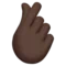 Hand with Index Finger and Thumb Crossed: Dark Skin Tone emoji on Apple iOS 16.4