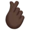 Hand with Index Finger and Thumb Crossed: Dark Skin Tone emoji on Apple iOS 17.4