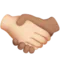 Handshake: Light Skin Tone, Medium Skin Tone emoji on Apple iOS 17.4