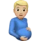 怀孕男性：中等偏浅肤色 iPhone 上的表情符号 (iOS 16.4)