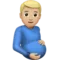 Pregnant Man: Medium-Light Skin Tone emoji on iPhone