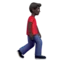 ️️ Muž chodící: tmavý odstín pleti, otočený doprava emoji na Apple iOS 17.4