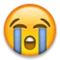 Hlasitě plačící tvář emoji na Apple iOS 5.0