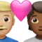 Par med hjärta: Man, Person, Mellanljus hudton, Mellanmörk hudton emoji på iPhone (iOS 16.4)