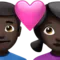 Couple With Heart - Man: Dark Skin Tone, Woman: Dark Skin Tone emoji on iPhone (iOS 16.4)