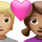 心形情侣：人物，女性，中等偏浅肤色，中等肤色 iPhone 上的表情符号 (iOS 14.6)