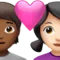 心形情侣：人物，女性，中深色肤色，浅肤色 iPhone 上的表情符号 (iOS 14.6)