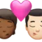 キス: 人物、男性、中程度の濃い肌の色、明るい肌の色 iPhoneの絵文字