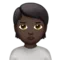 Persona fent morros: to de pell fosc emoji a Apple iOS 15.4