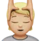 接受按摩者：中等偏浅肤色 iPhone 上的表情符号 (iOS 13.3)