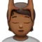 Person Getting Massage: Medium-Dark Skin Tone emoji on Apple iOS 14.2