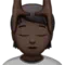 Person Getting Massage: Dark Skin Tone emoji on iPhone