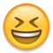 Smilende mysende ansikt emoji på Apple iOS 6.0